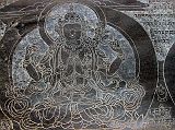 Manaslu 05 11 Ghap Mani Carving Avalokiteshvara with 4 Arms The mani wall in Ghap has particularly elegant carvings, one of which is the four-armed Avalokiteshvara.